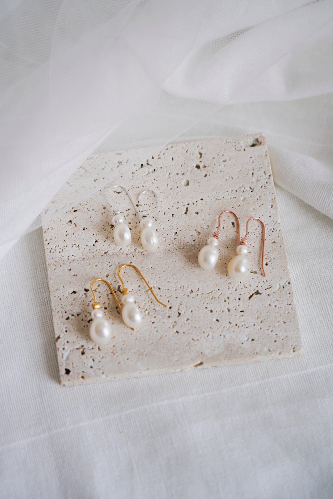 Pearl and zircon earrings