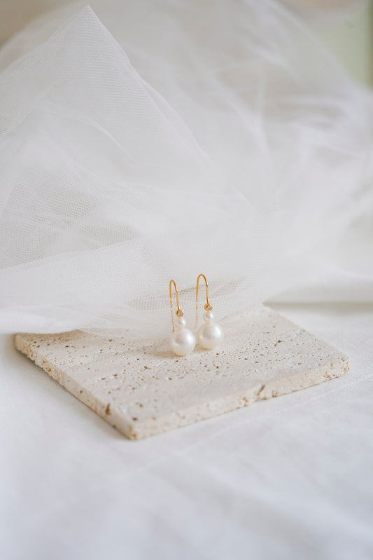 Pearl and zircon earrings