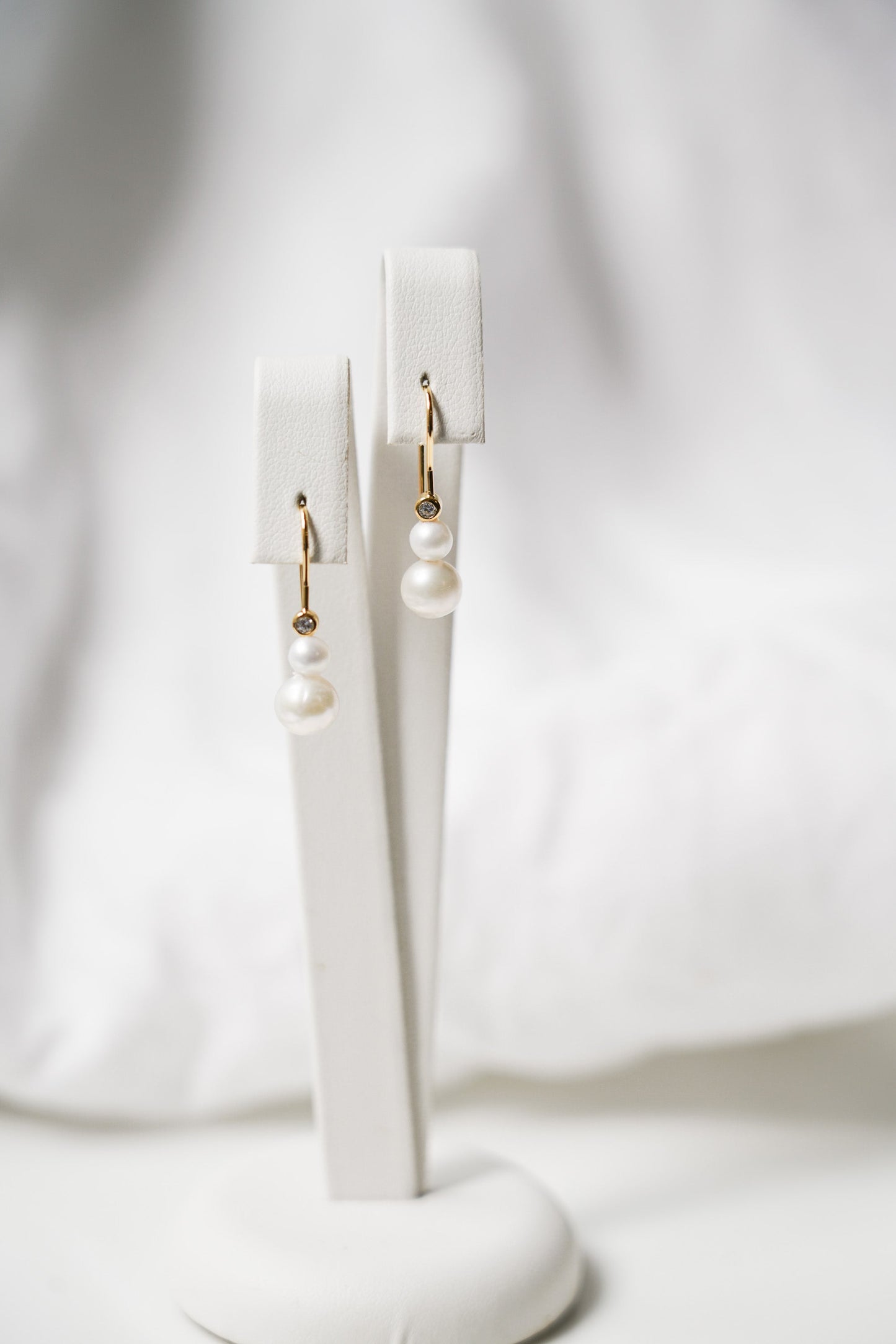 Pearl and zircon earrings