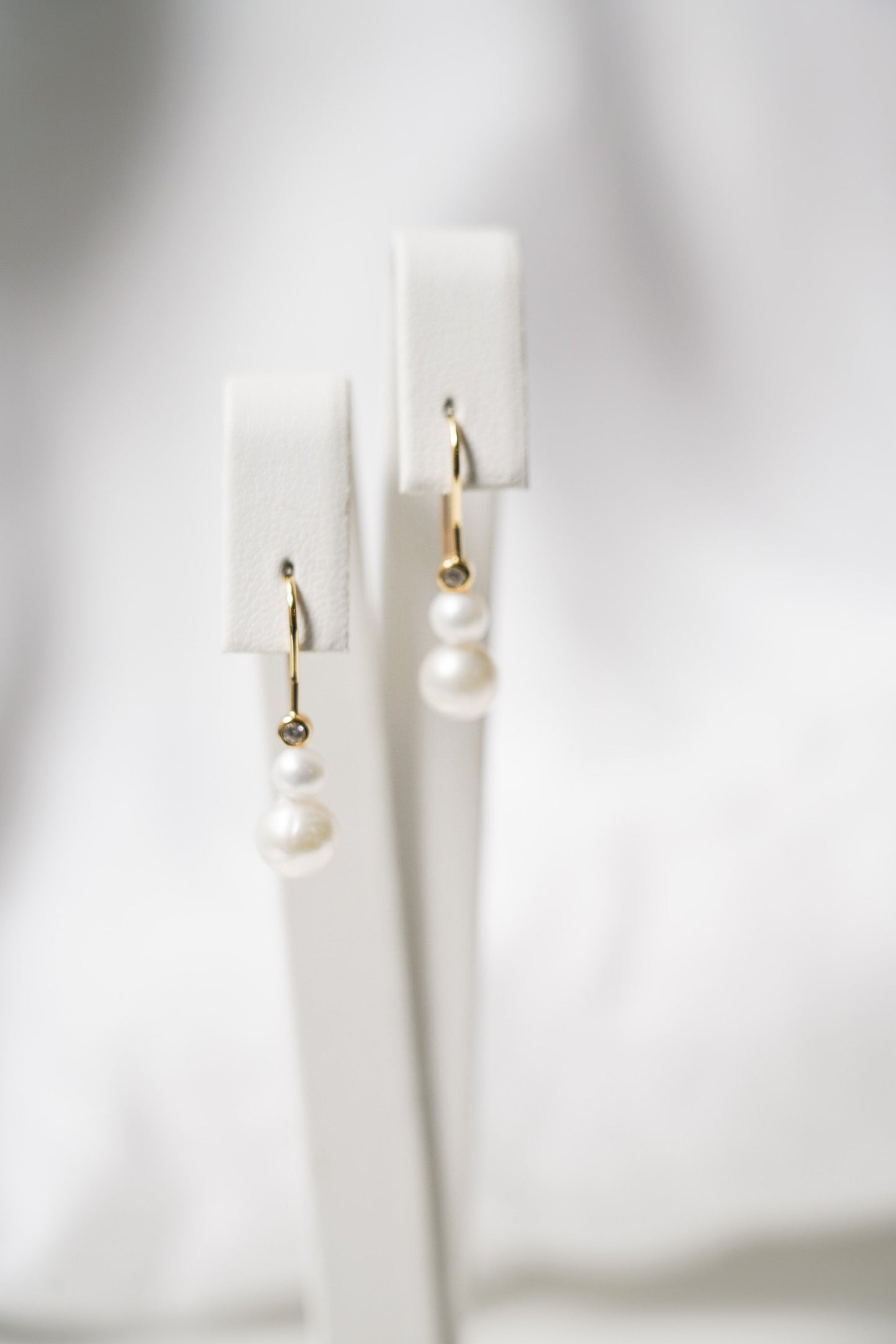 Pearl and zircon earrings