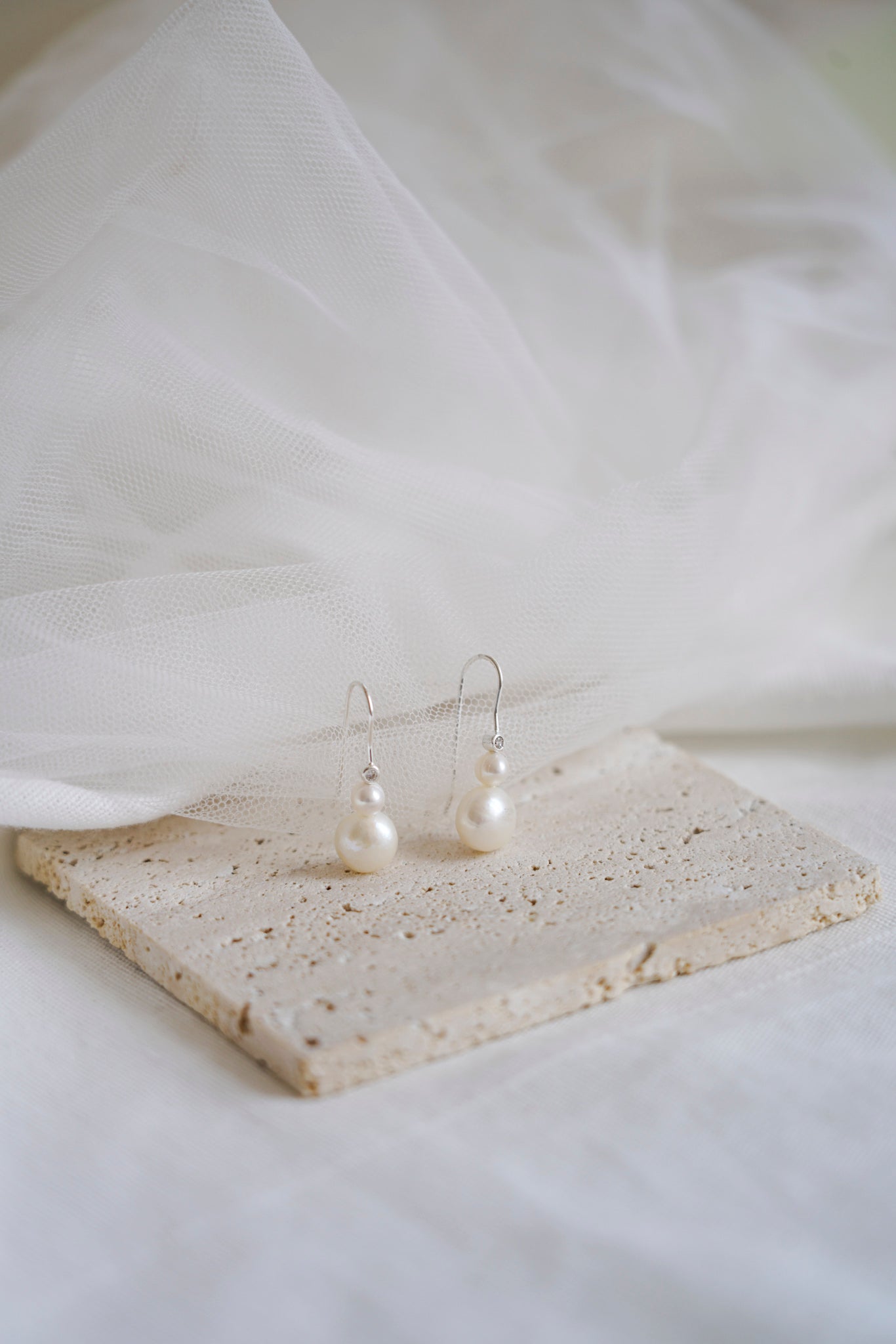 Pearl and zircon earrings