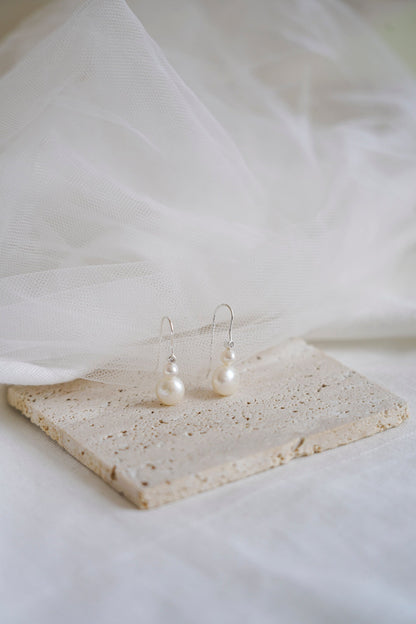 Pearl and zircon earrings