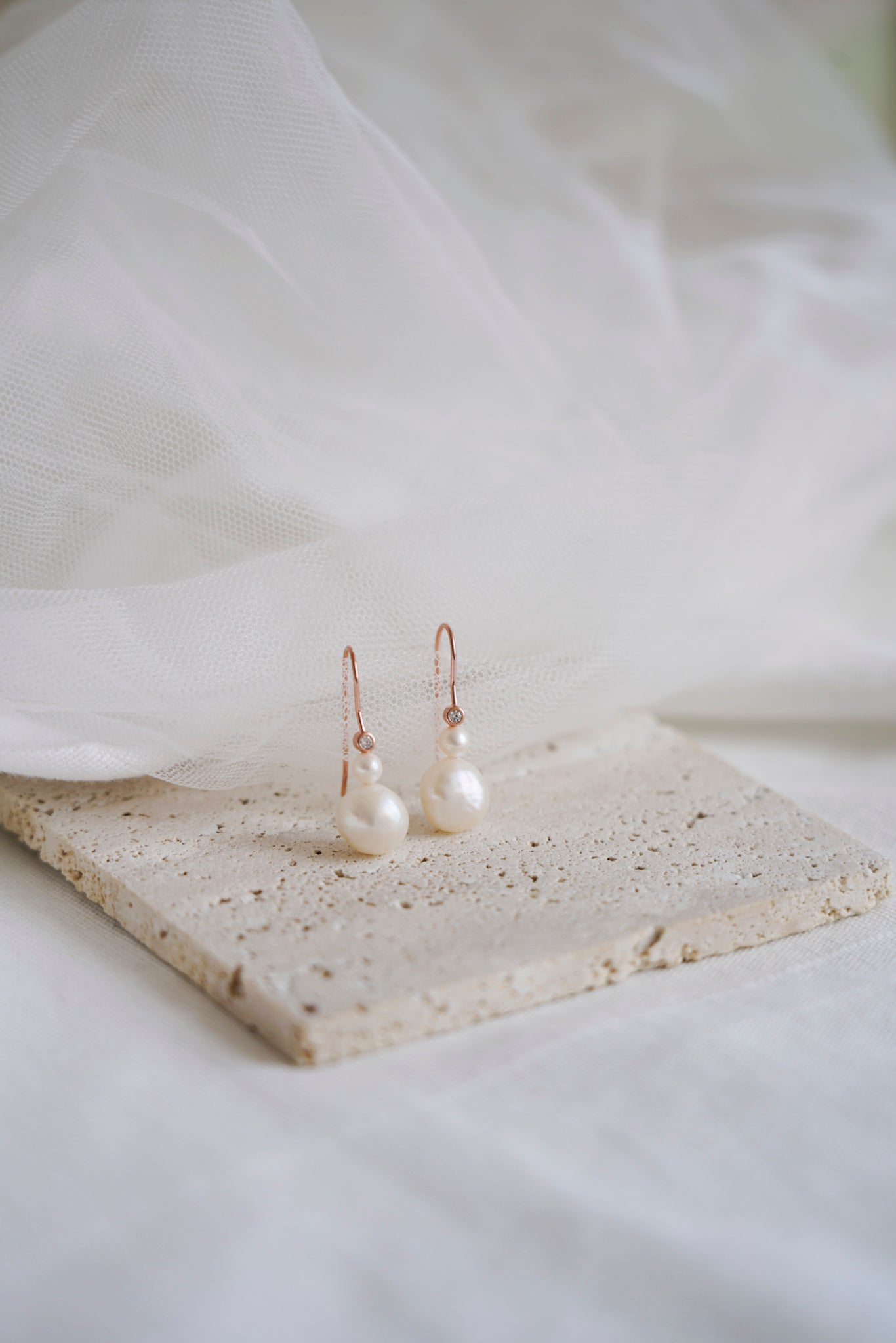 Pearl and zircon earrings